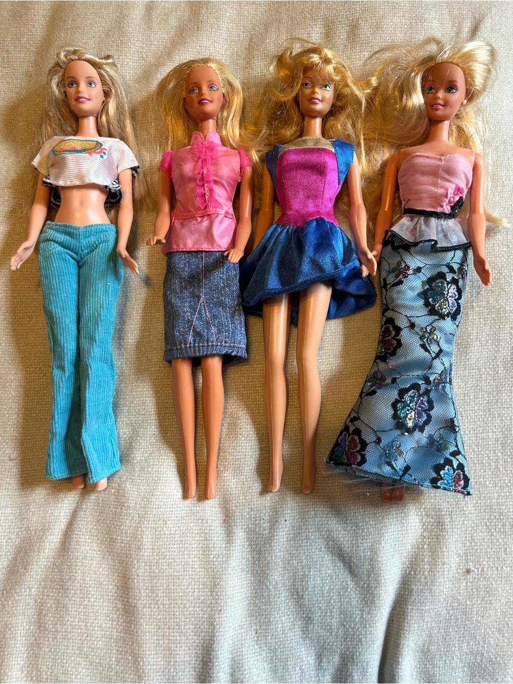Lot of 4 vintage Barbies